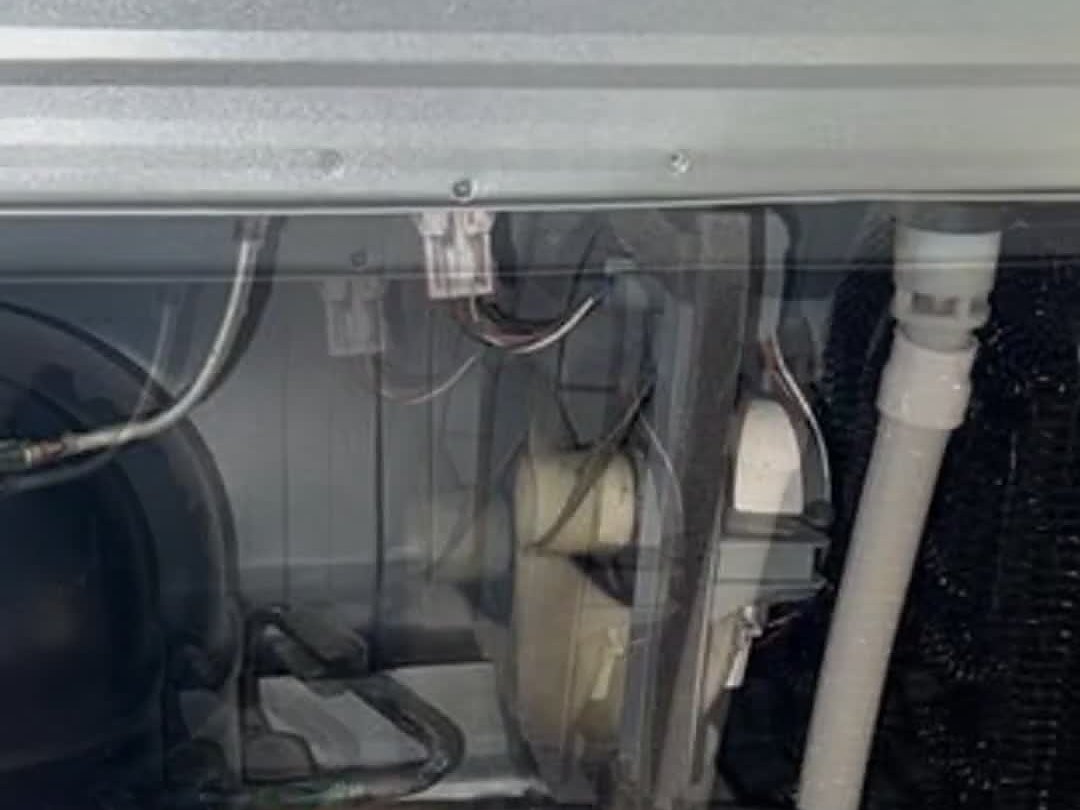 Compressor bay after a completed refrigerator repair